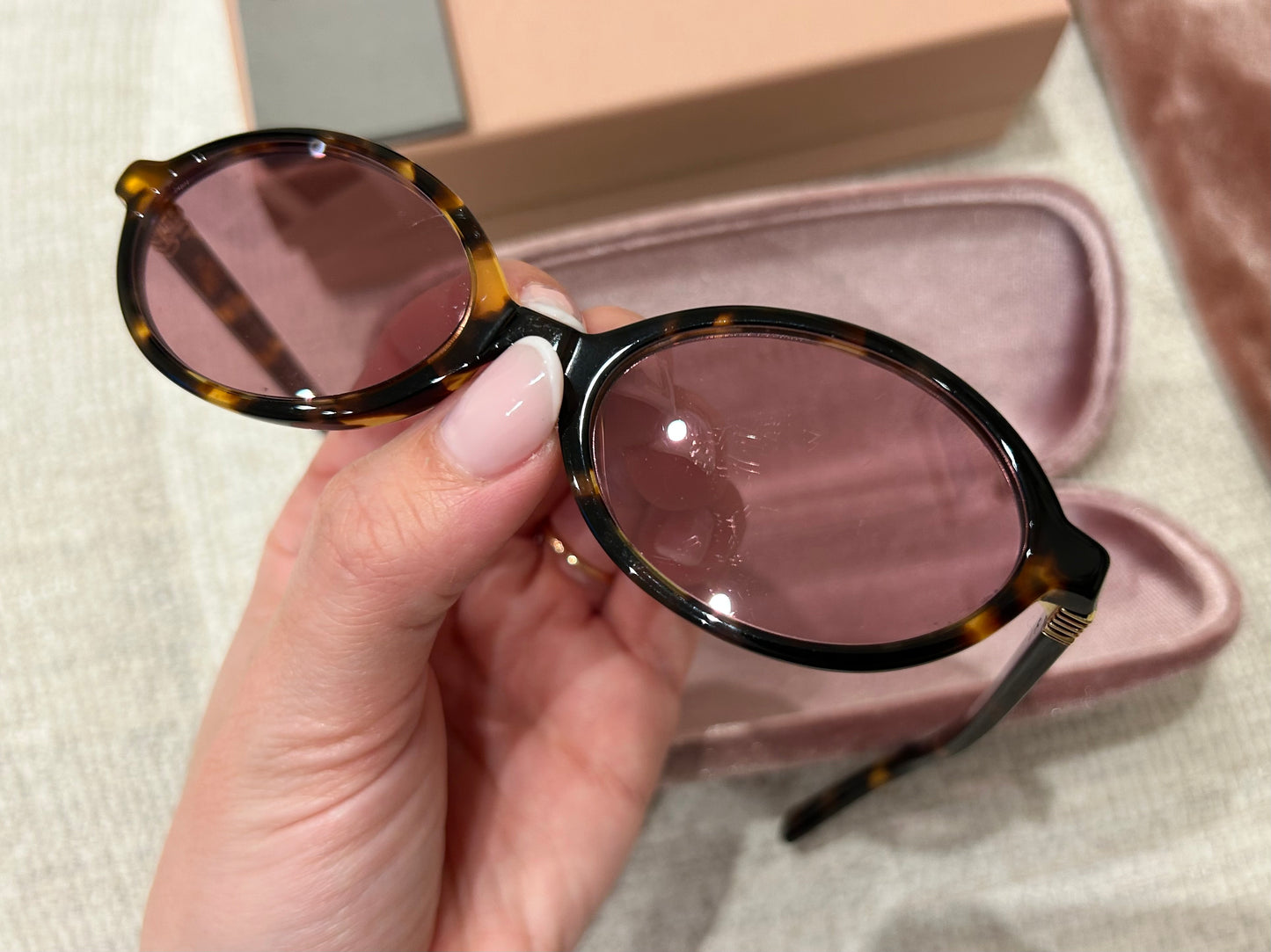 Oval tortoiseshell sunglasses