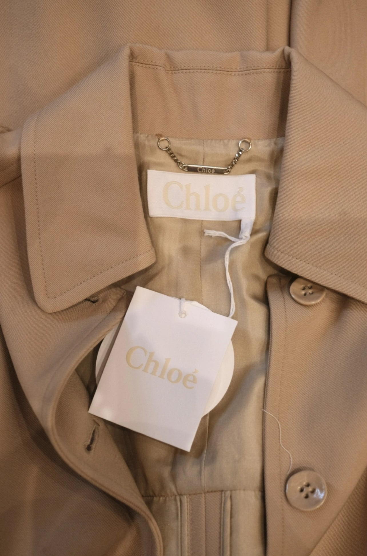 Beige cape trench