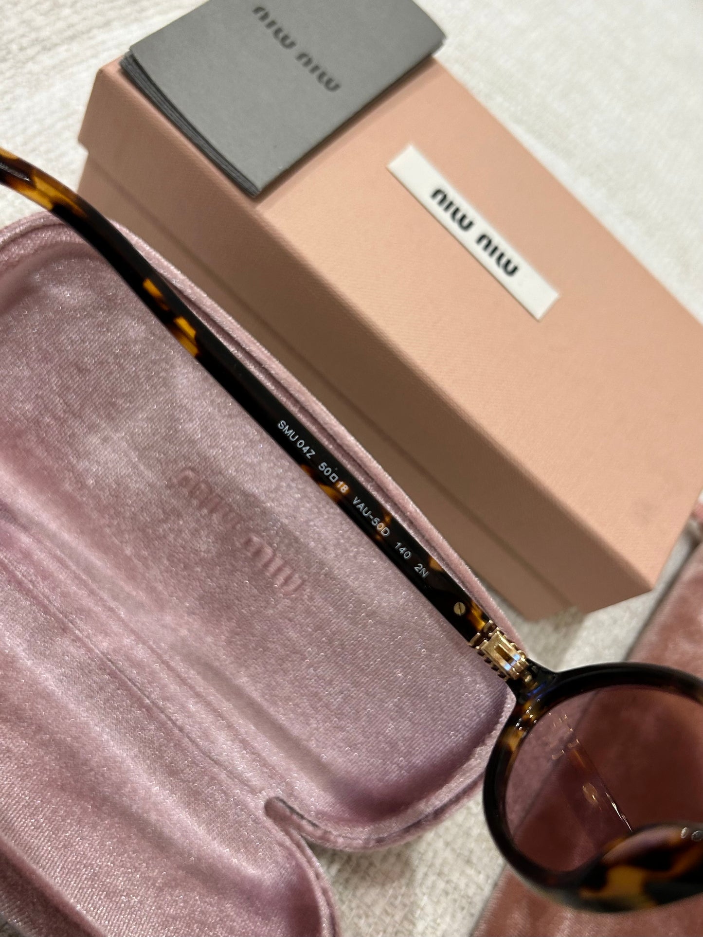 Oval tortoiseshell sunglasses