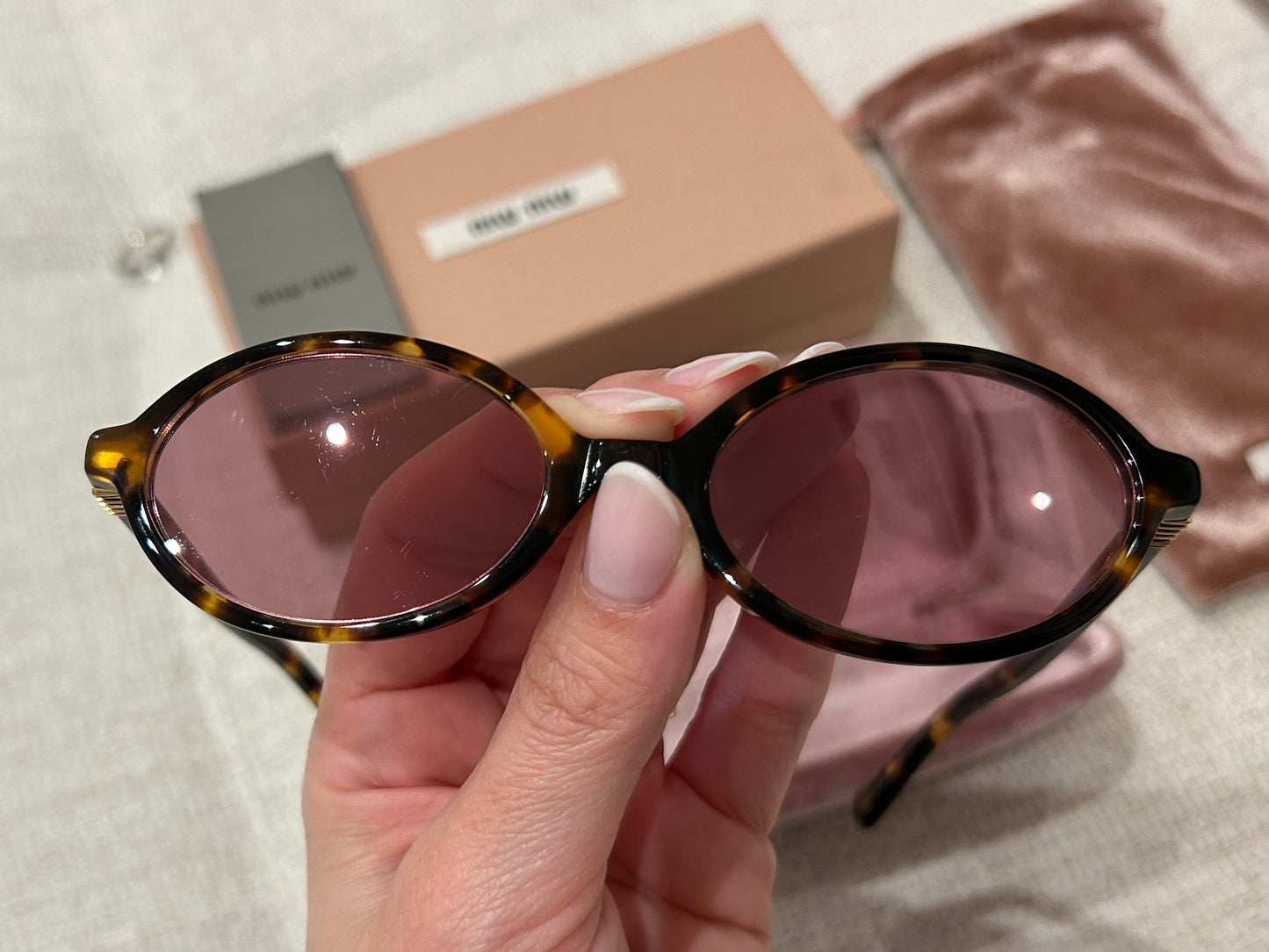 Oval tortoiseshell sunglasses