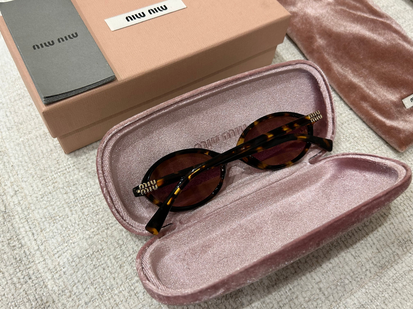 Oval tortoiseshell sunglasses