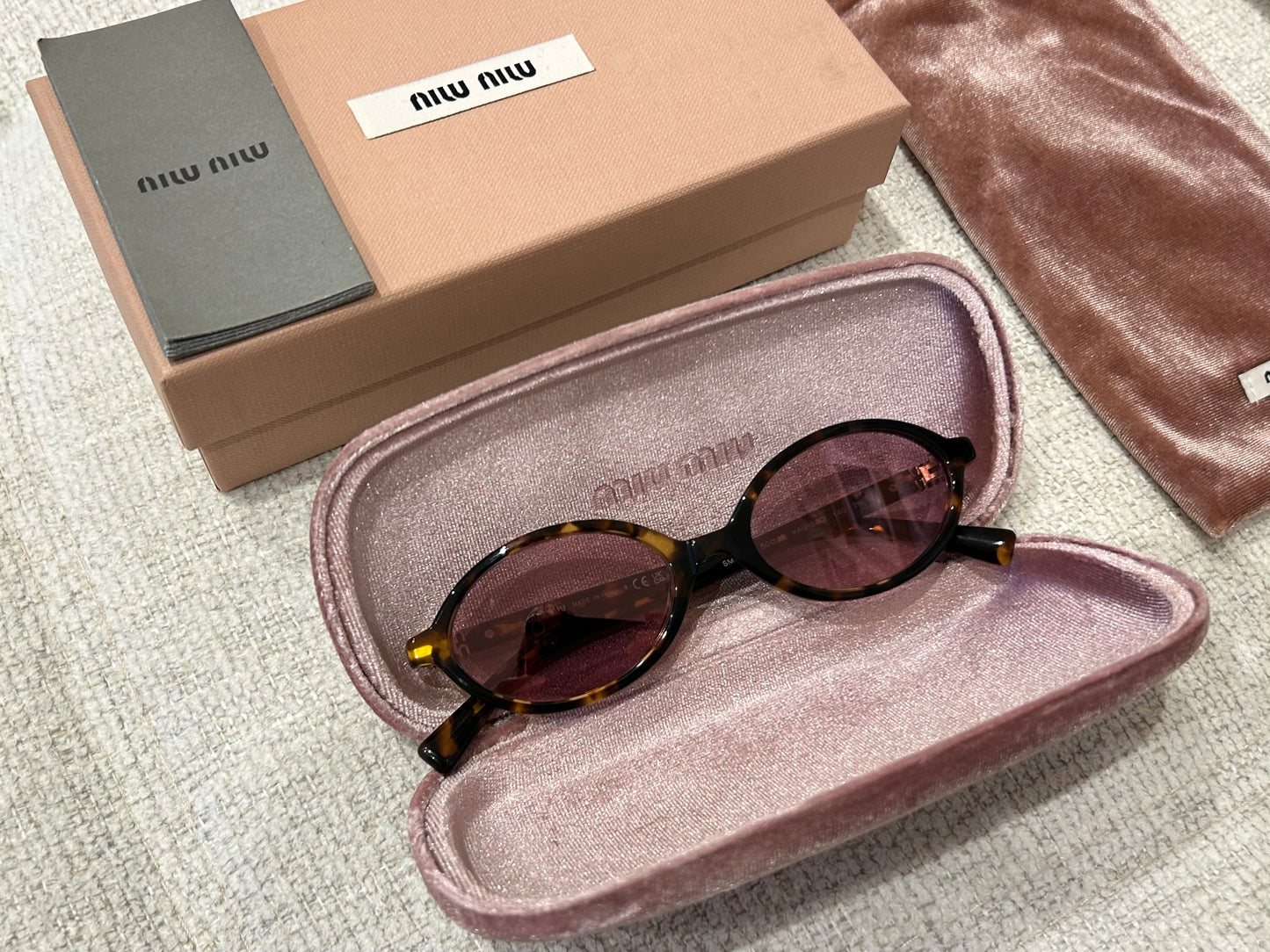 Oval tortoiseshell sunglasses