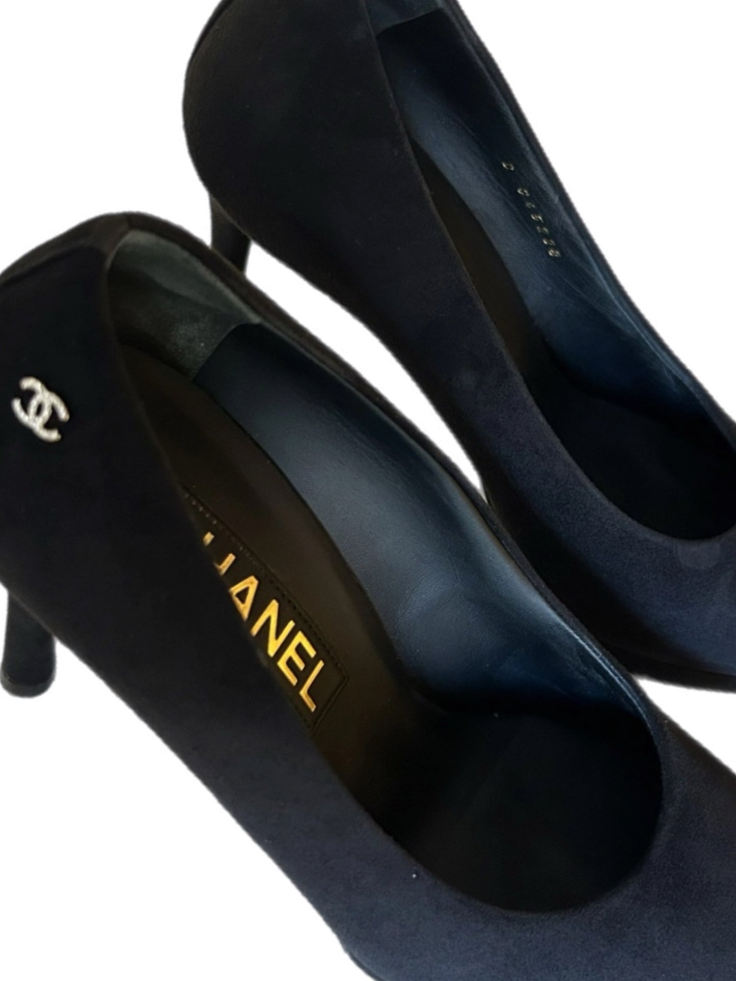 Black suede pumps