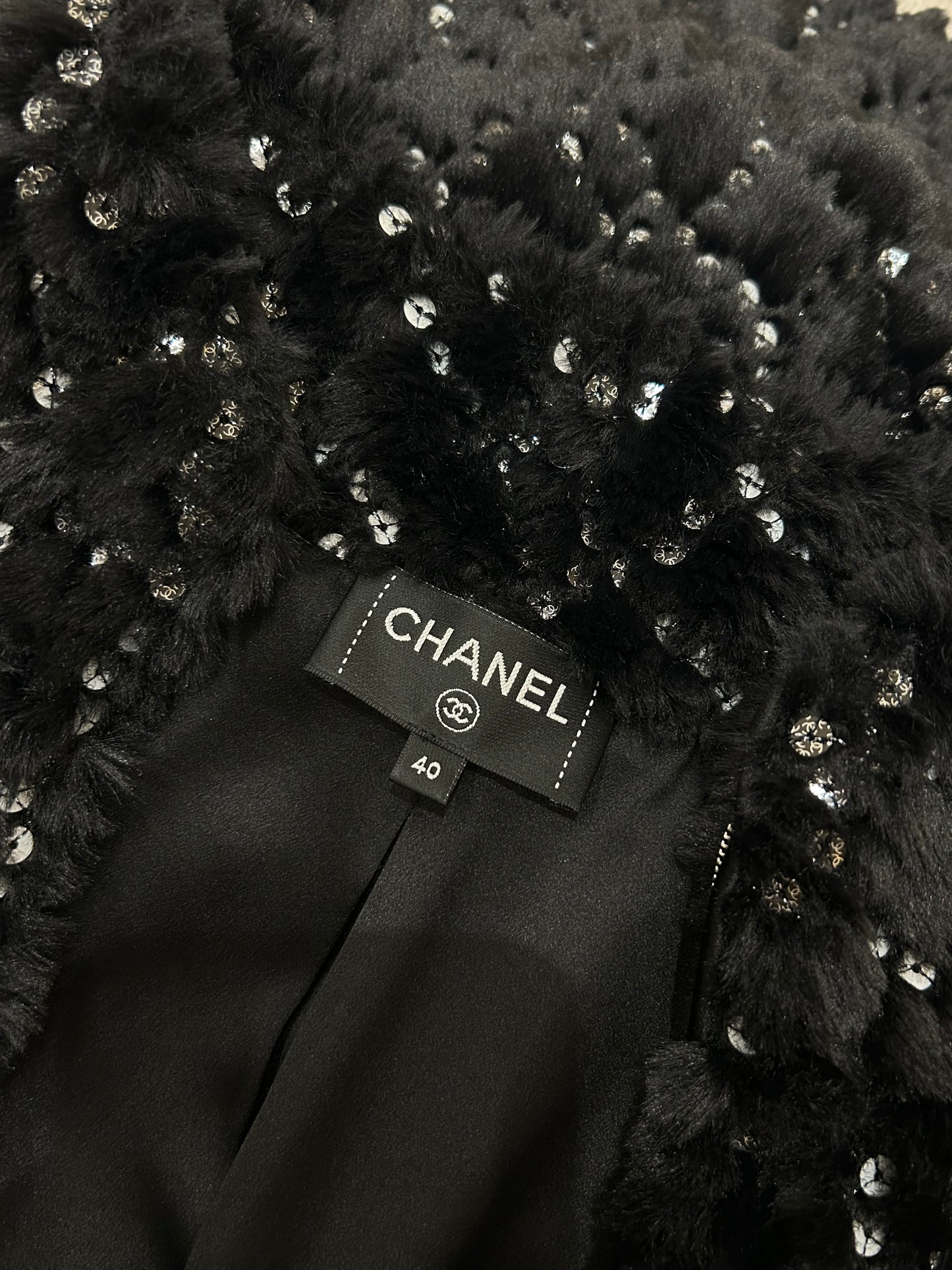 Faux fur and sequins jacket