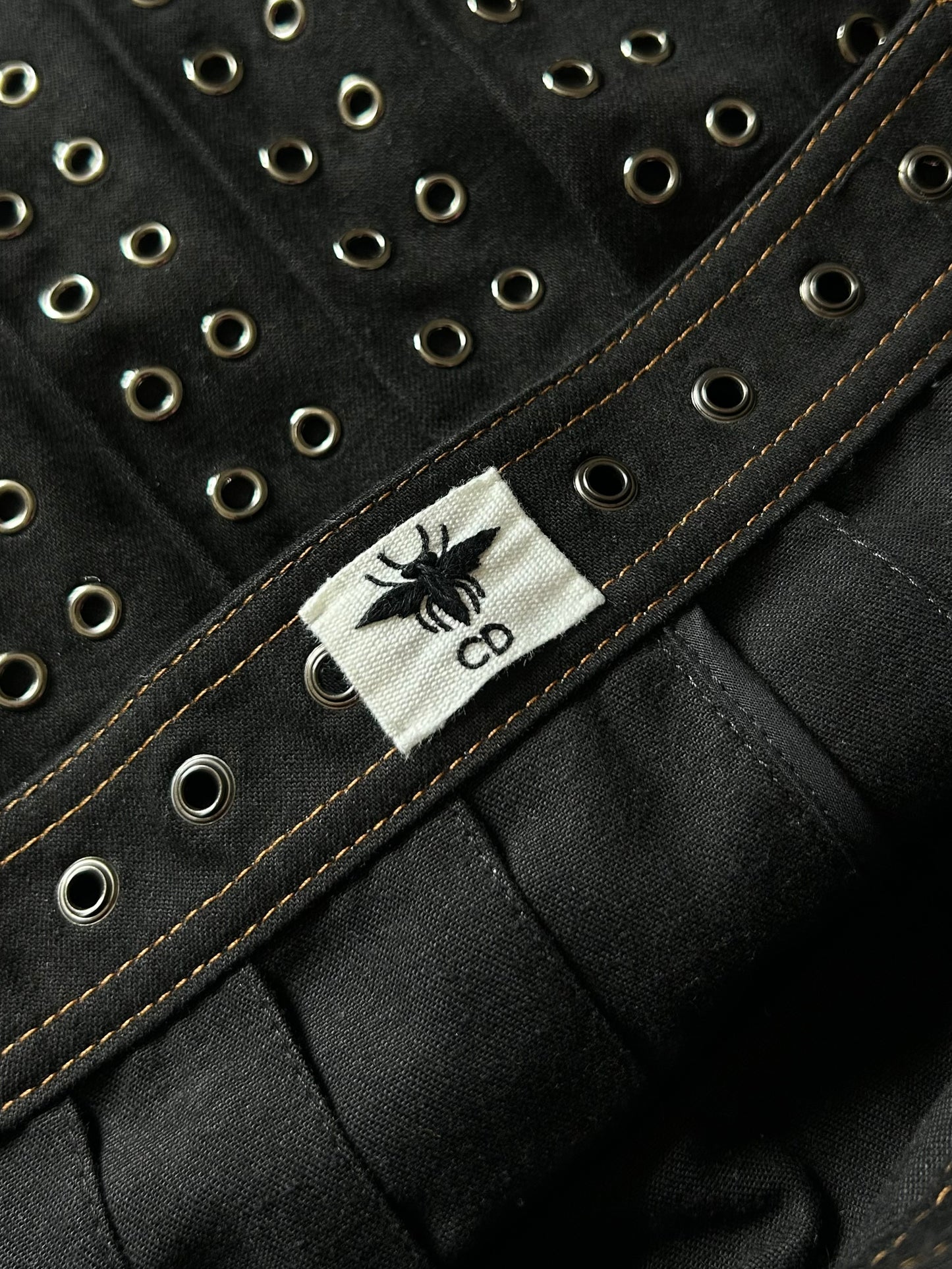 Pleated studded skirt