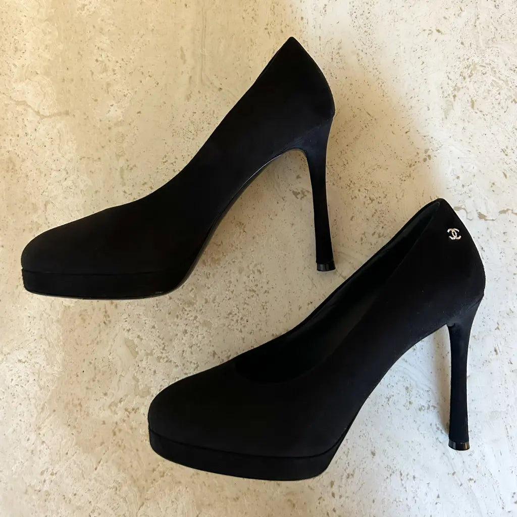 Black suede pumps